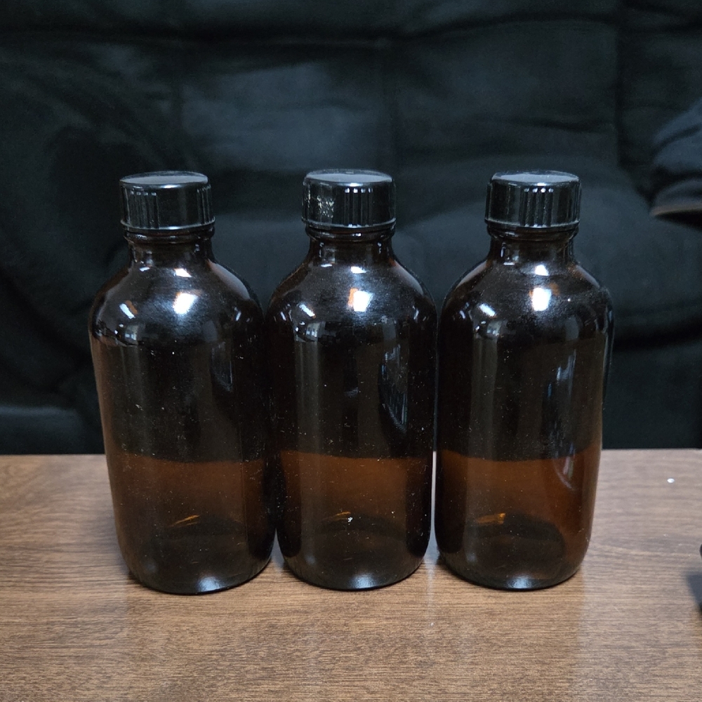 Set of Three Amber Glass Bottles